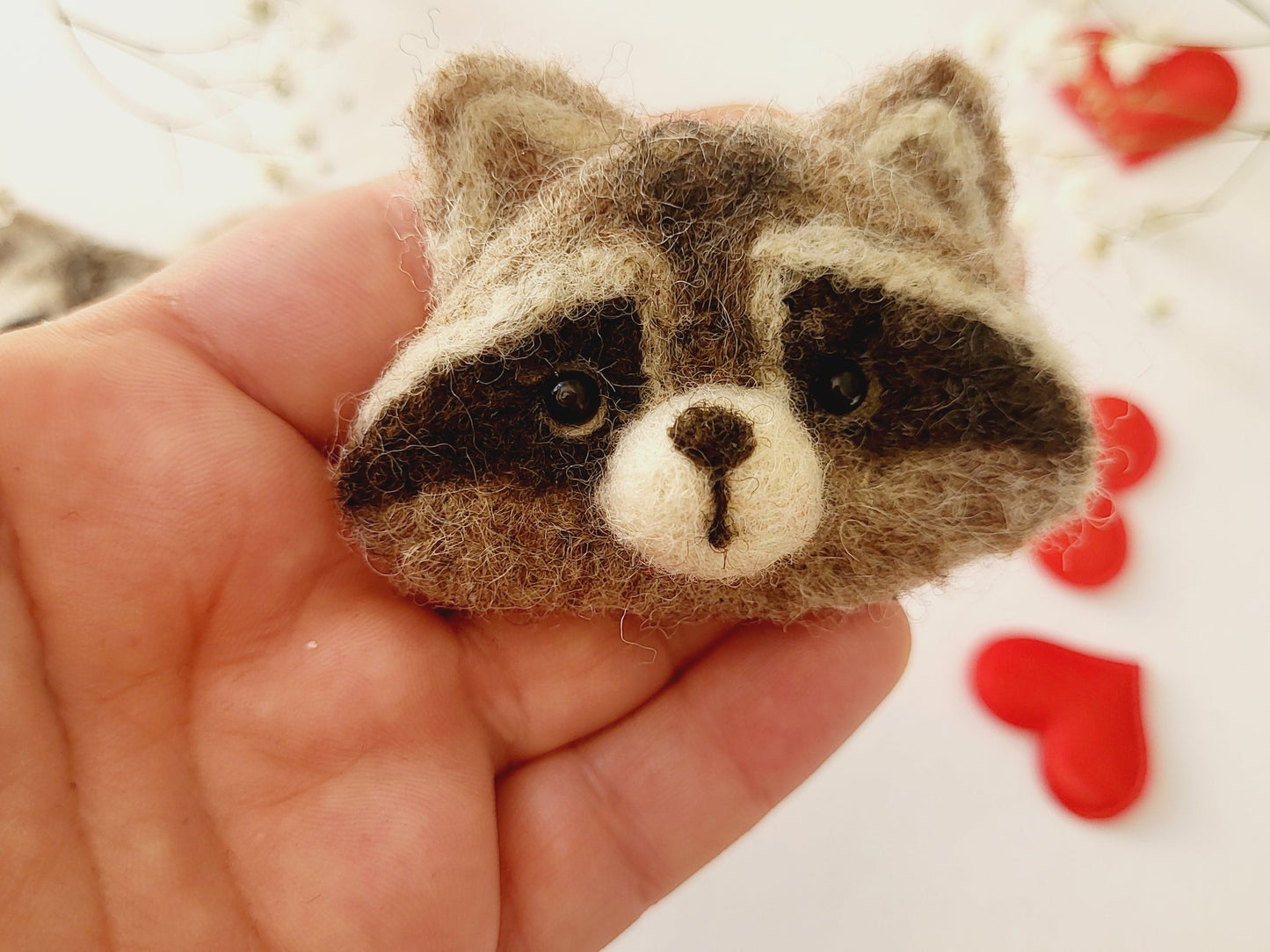 Broșă cap de raton