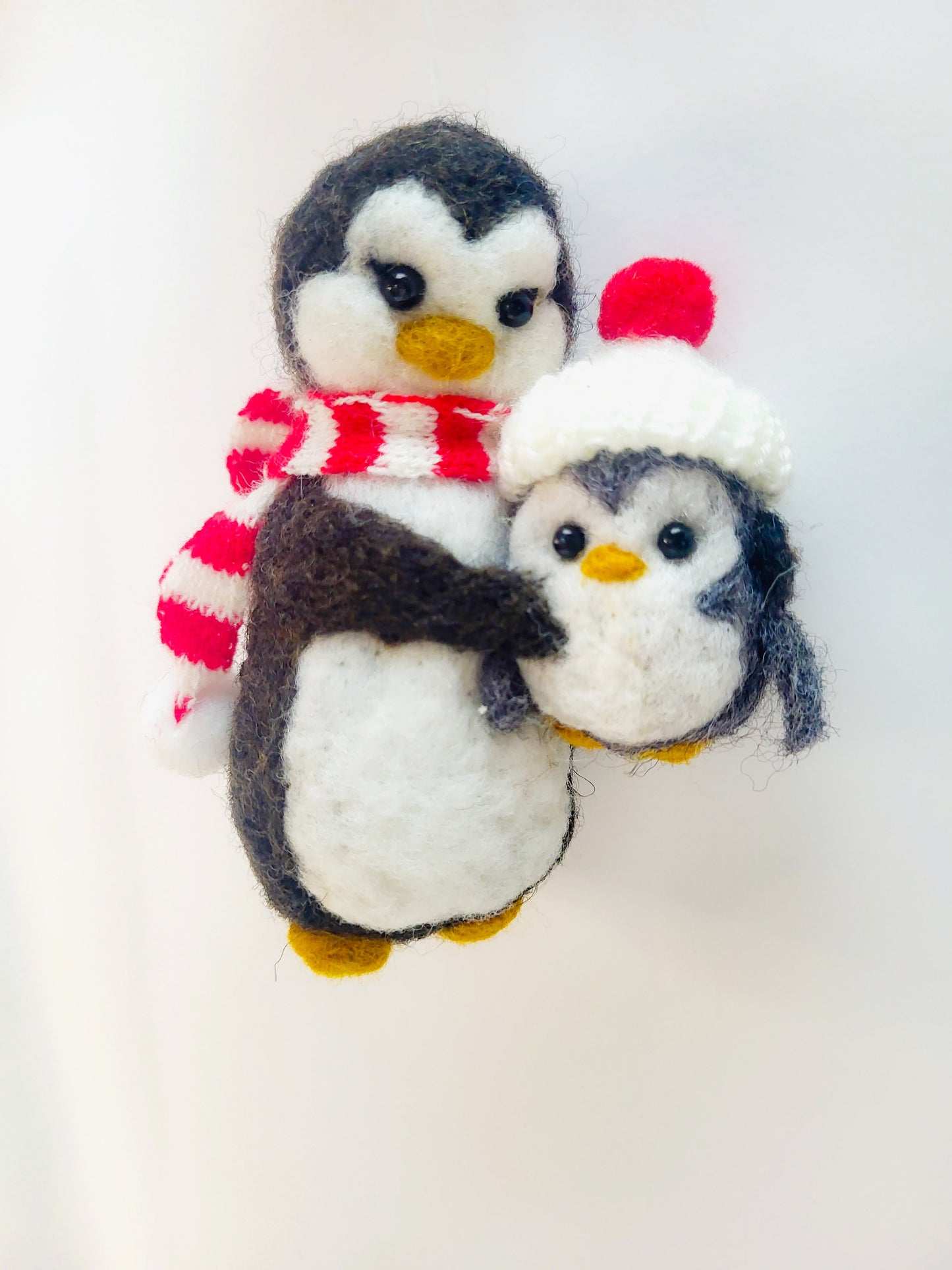 Pinguini mama și puiul