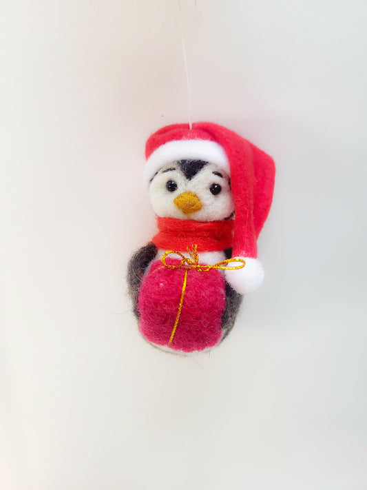 Pinguin cu fes roșu