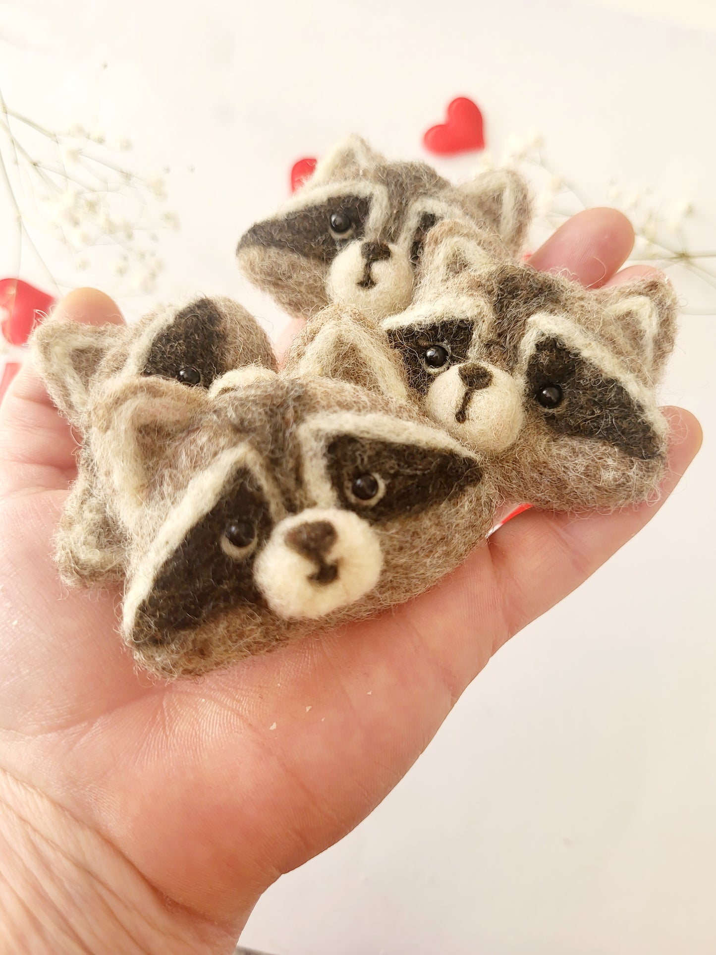 Broșă cap de raton