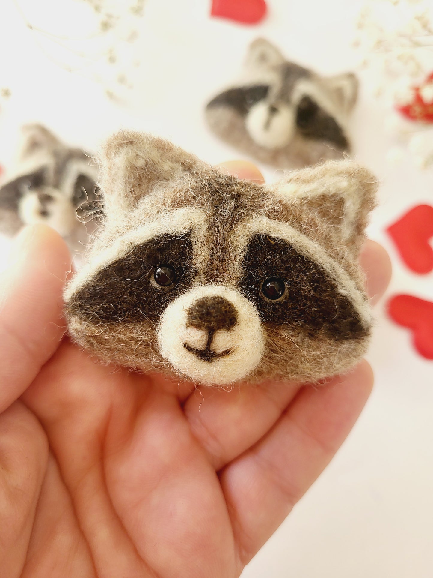 Broșă cap de raton