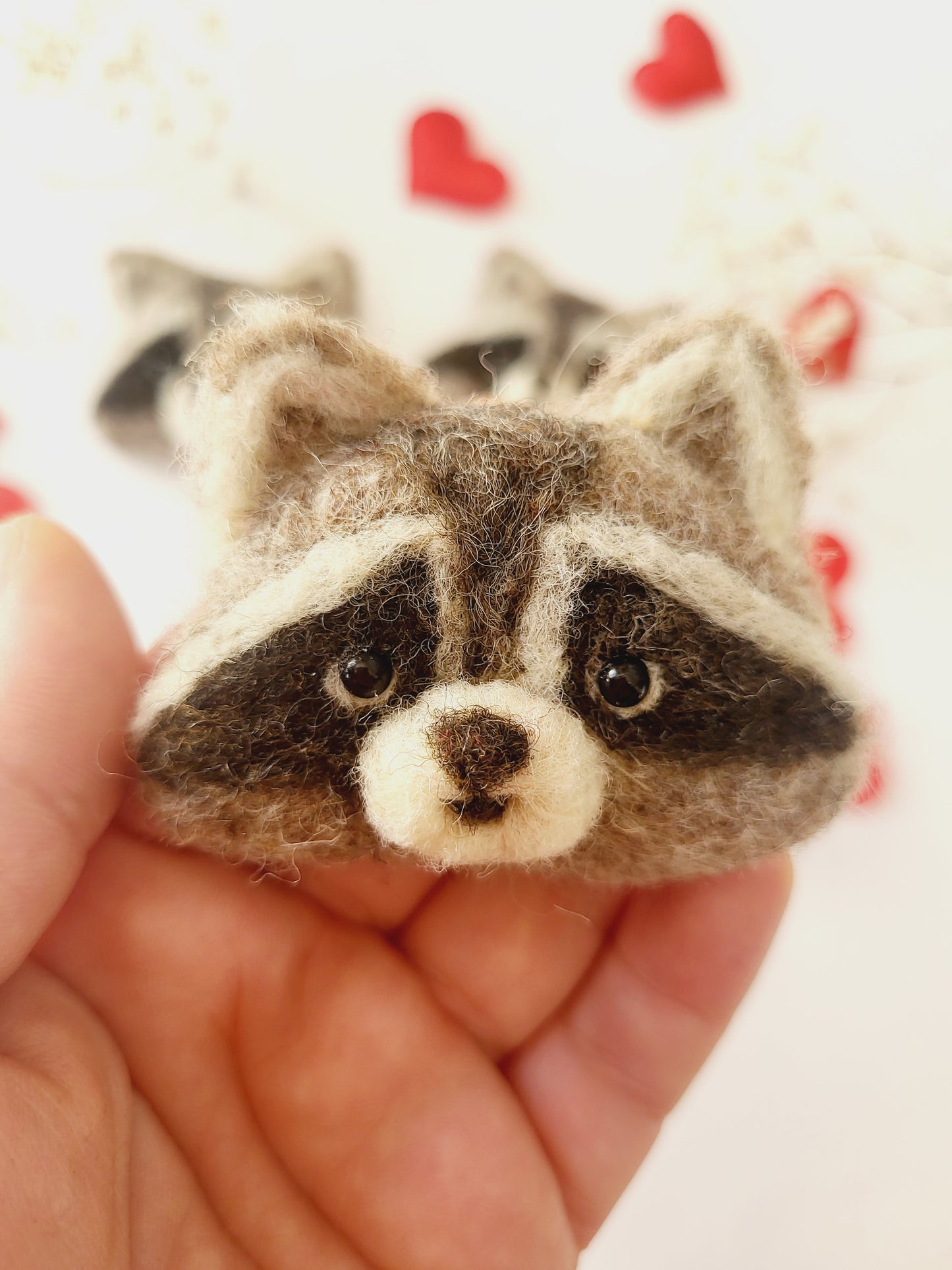 Broșă cap de raton