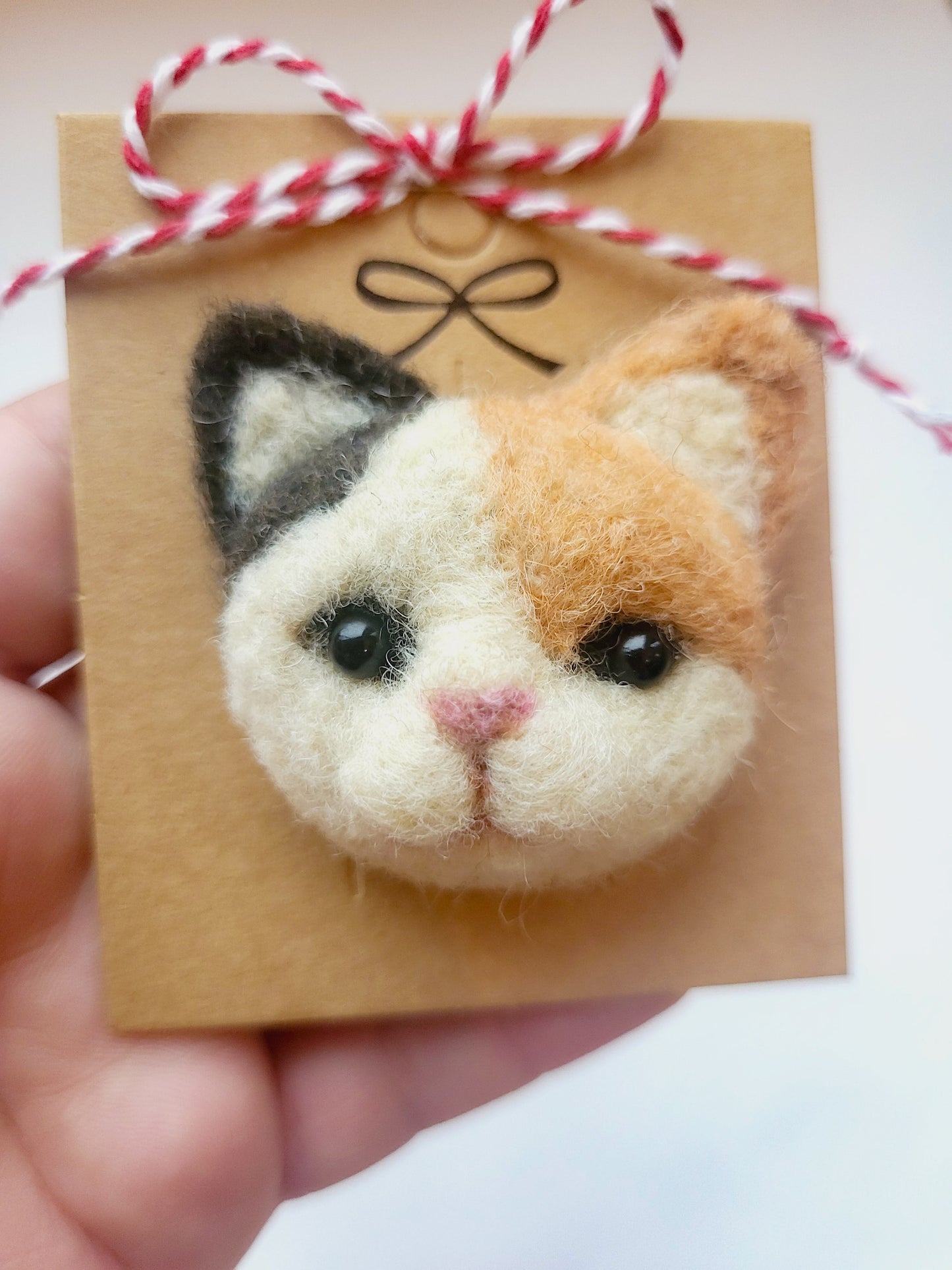 Broșă cap de pisică