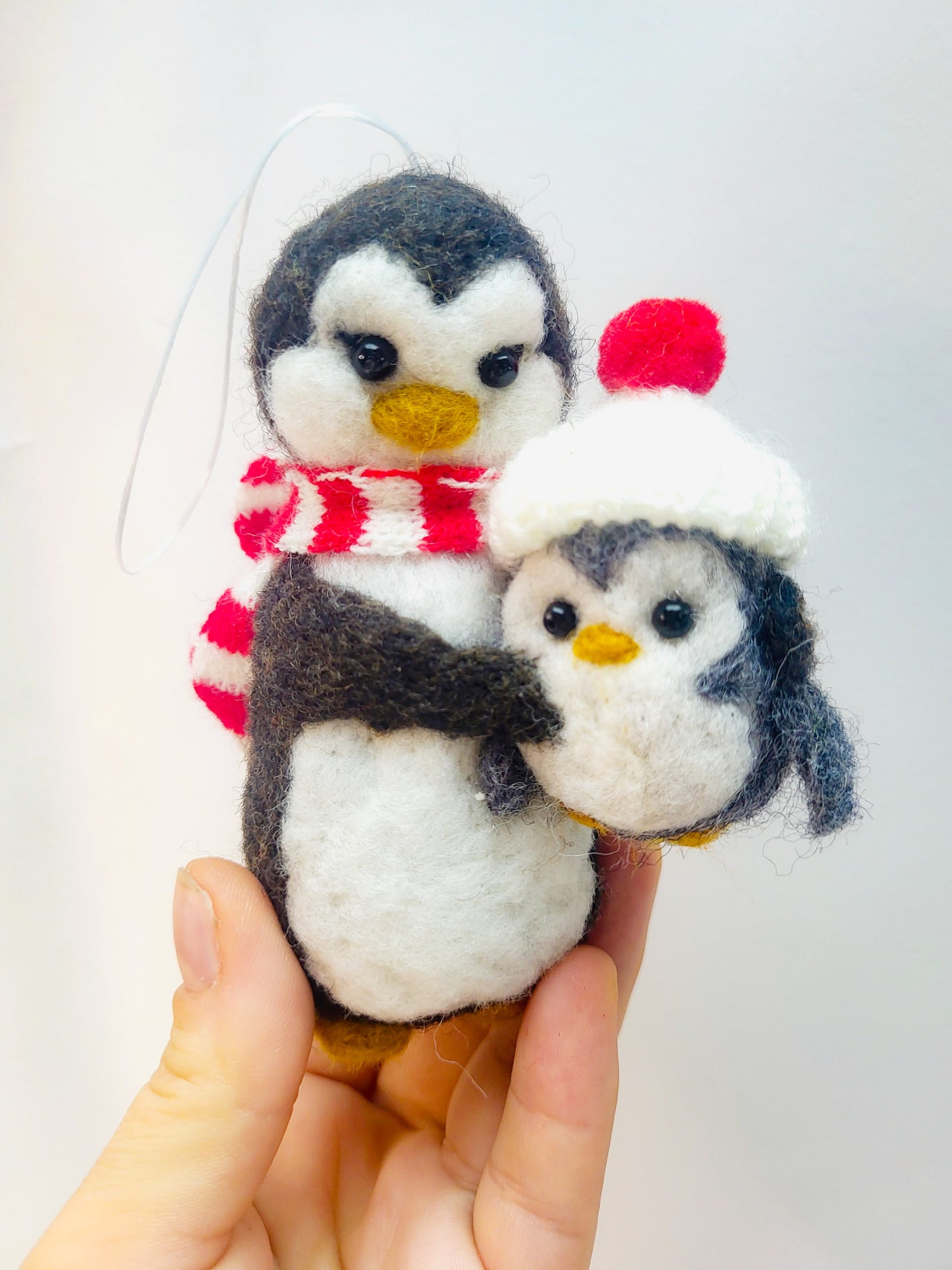 Pinguini mama și puiul