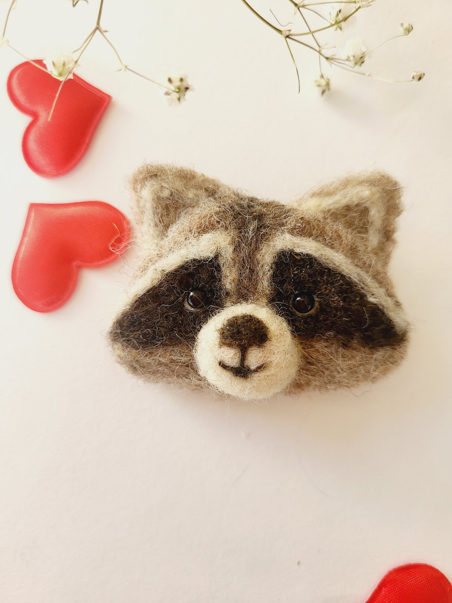 Broșă cap de raton